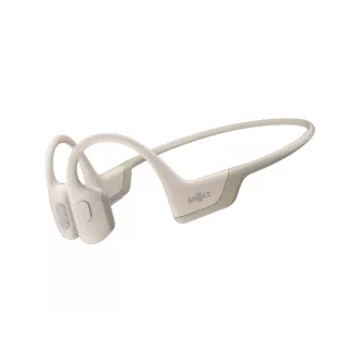 Shokz OpenRun PRO Bluetooth-Kopfhörer vor den Ohren, beige